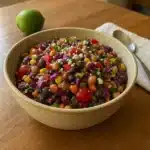 Dense Bean Salad: 4 Simple Steps to Make This Epic Recipe 5 Dense bean salad with black beans, corn, cherry tomatoes, and red cabbage in a white bowl