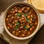 Charro Beans Recipe: The Best Easy & Smoky Mexican Side Dish 5 Final serving of charro beans with cilantro and tortillas