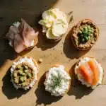 High Protein Bagels: Easy 30g Recipe You’ll Make on Repeat 11 High-protein bagel toppings with turkey, yogurt, eggs, nut butter, salmon, and hummus