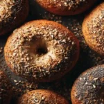 Healthy Multigrain Bagel Recipe You’ll Love. Powerful & Easy 12 Multigrain bagels fresh from oven on a rustic rack