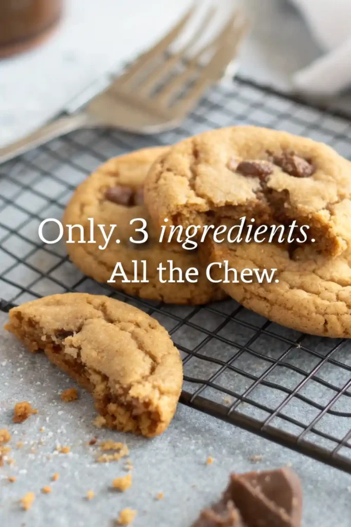 Quick & Chewy 3‑Ingredient Peanut Butter Cookies 3 Chewy chocolate chip cookies with bite taken out, cooling on rack with crumbs