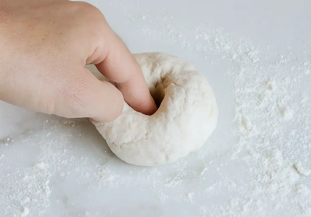 High Protein Bagel with Greek Yogurt Recipe You’ll Actually Crave 24 bagel dough hole 1000x700 1
