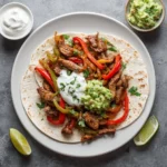 sizzling steak shrimp fajitas dinner 2025 10 04 222659 150x150 1