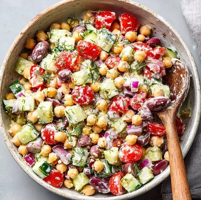 Colorful Greek Chickpea Salad with vegetables and feta cheese