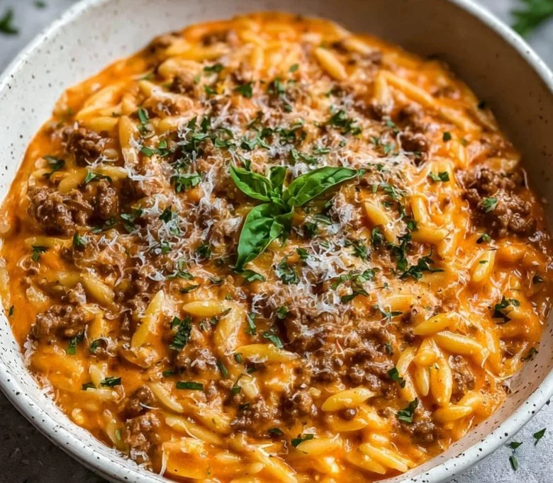 Delicious Ground Beef Orzo served in a bowl with fresh herbs