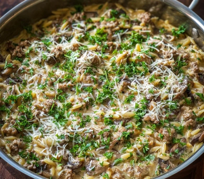 Delicious Turkey Mushroom Orzo dish served in a bowl with herbs