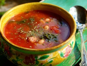 One-Pot Kale, White Bean & Sausage Soup in a bowl for cozy nights