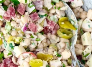 High-protein Italian grinder bean salad with fresh vegetables and dressing