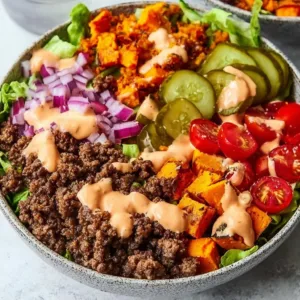 Crispy Sweet Potato Burger Bowl with fresh vegetables and sauce